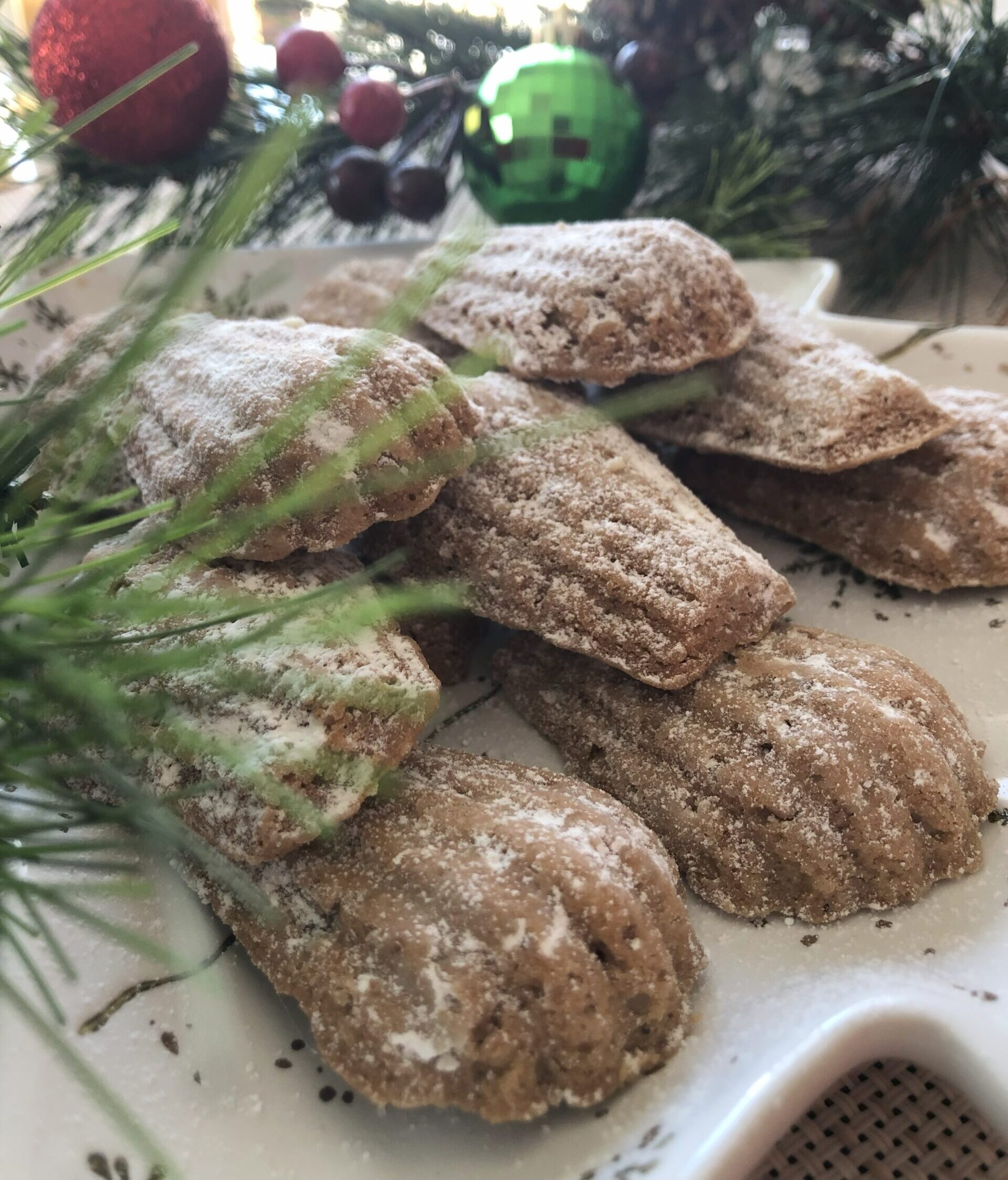 Spiced Bear Foot Cookies displayed on Christmas decorated table.