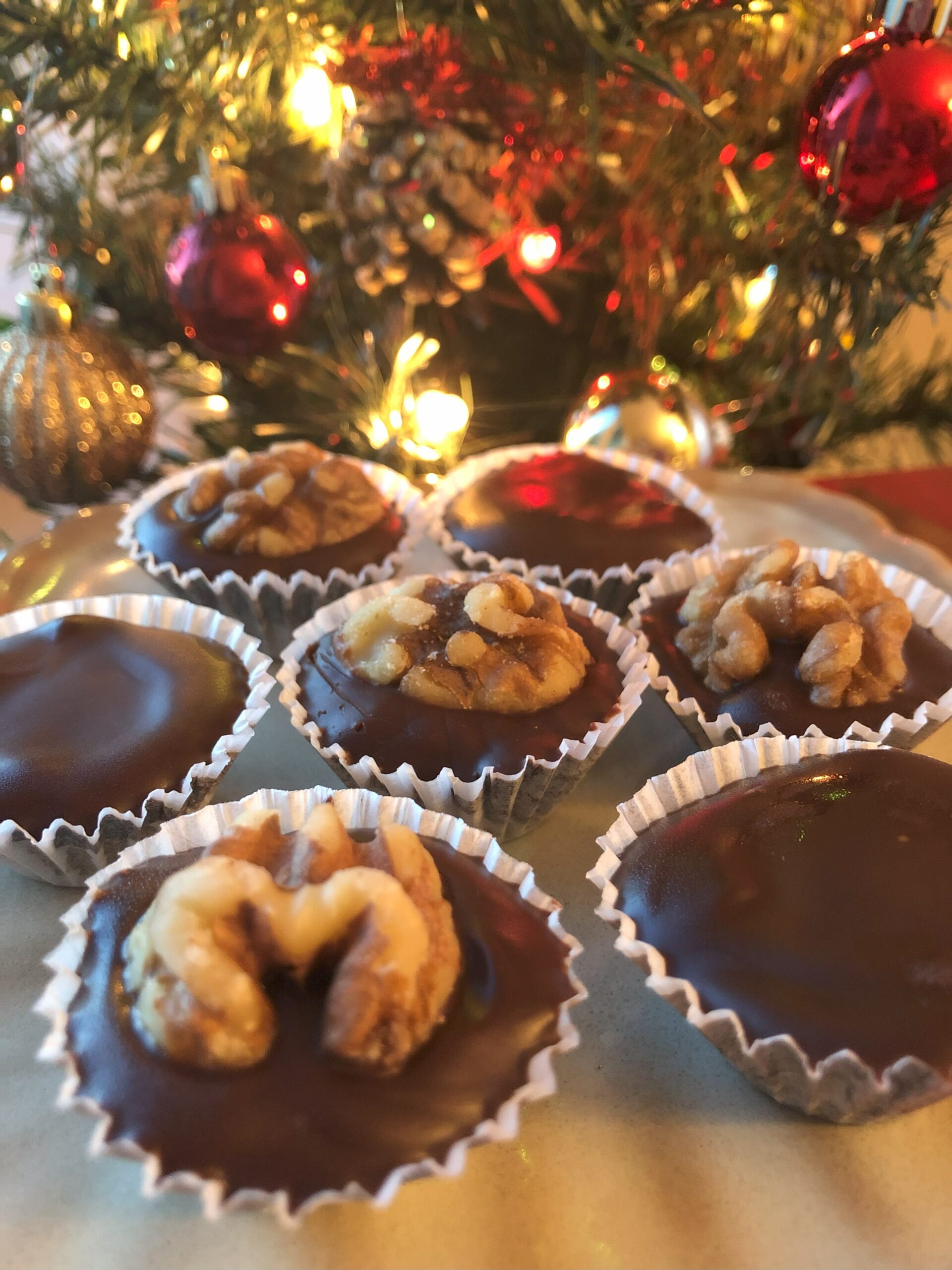 Rum Nut Chocolate Cups displayed on festive table.