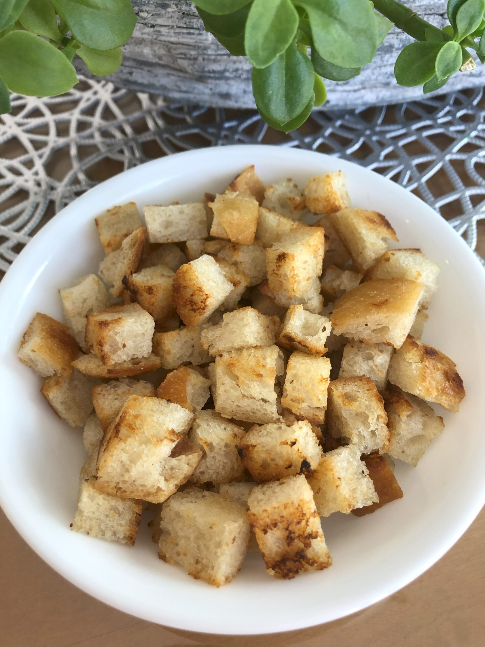 Crunchy bread croutons in a bowl.