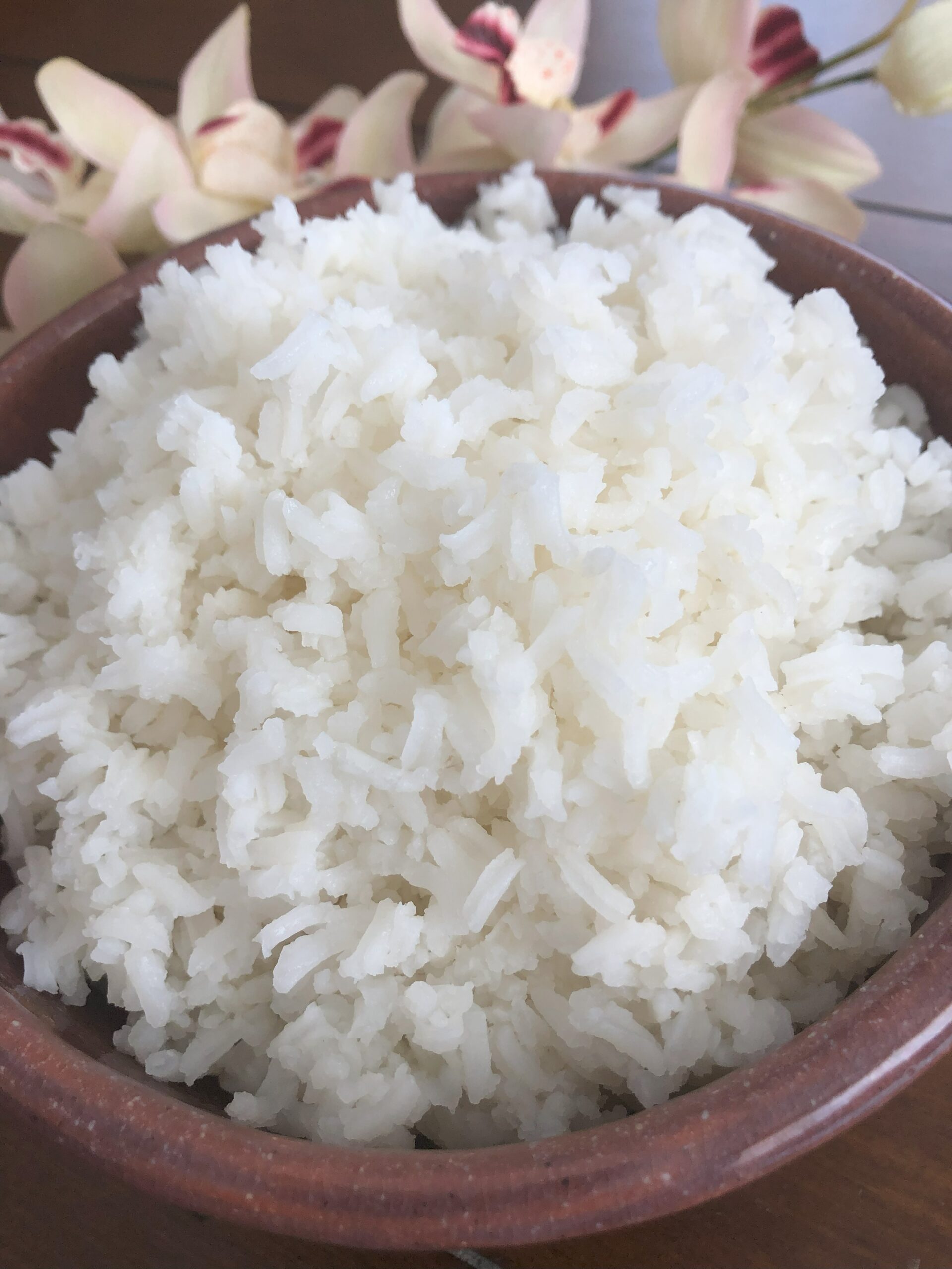 White Rice in the bowl on the table.