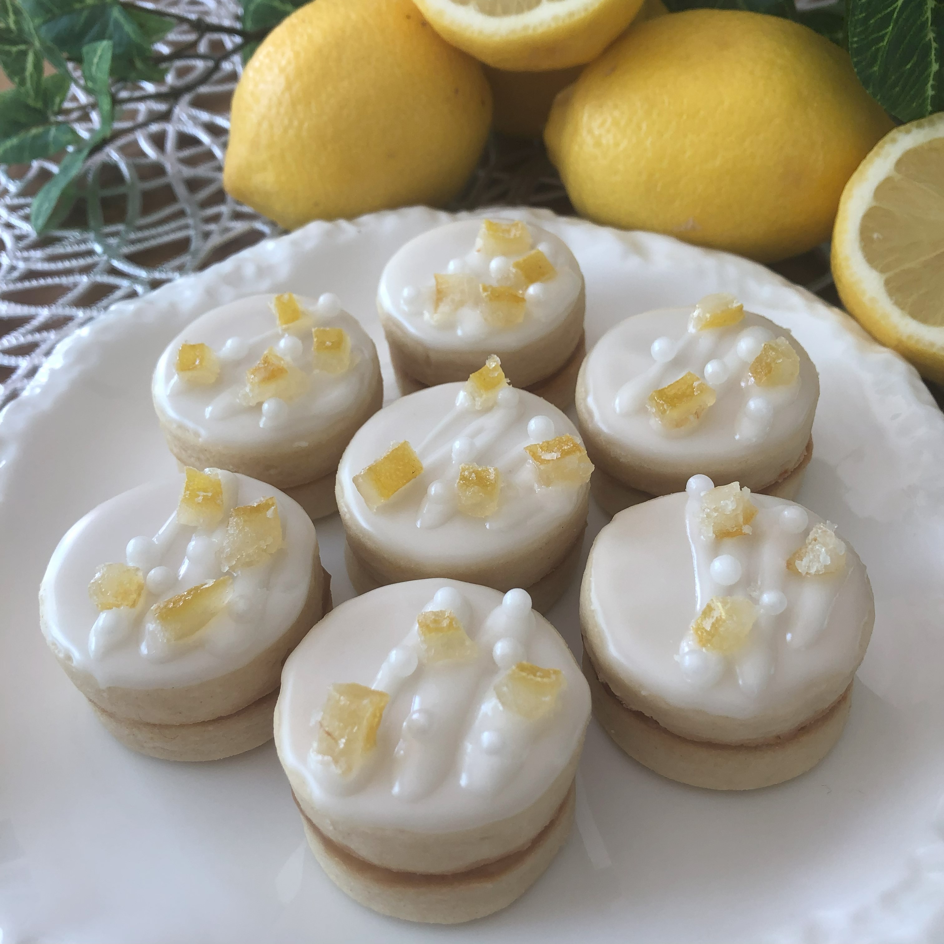 Lemon Cookie Sandwiches on the plate on the table.