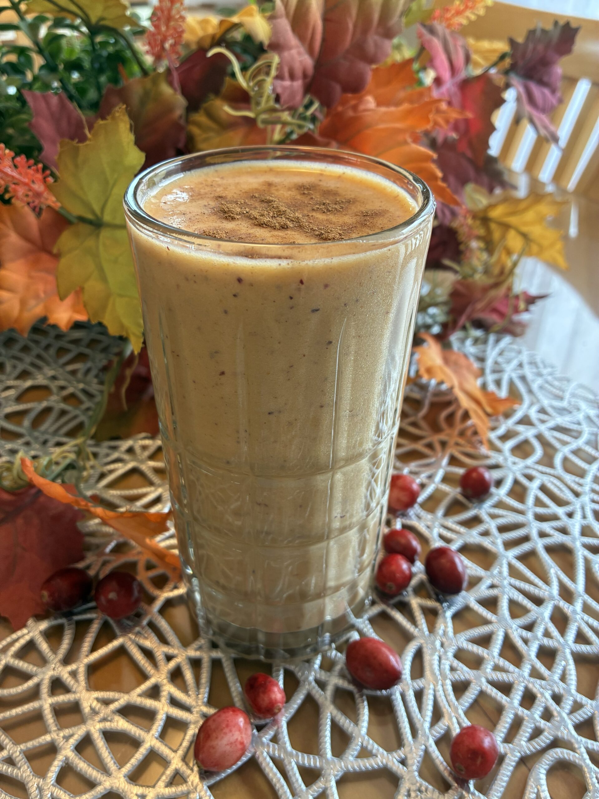 Pumpkin Cranberry Probiotic Smoothie on the table in the glass.